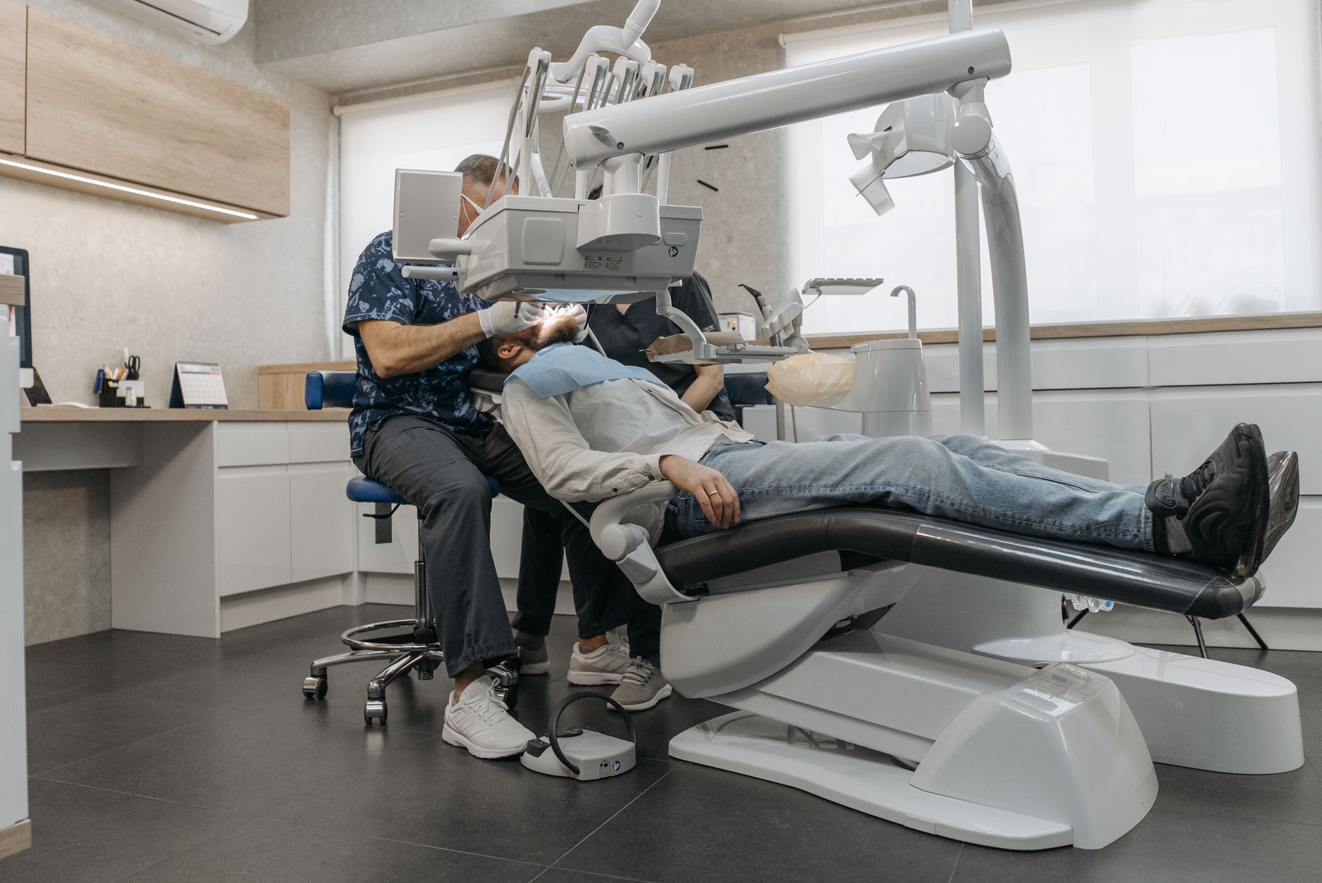 Dr. Raman with a patient